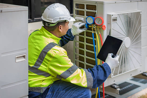 Professional Air Duct Cleaning technician working in Hartsville, IN